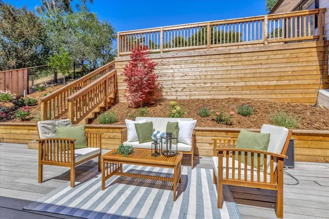 a view of a chairs on the deck