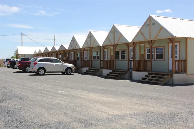 a car parked in front of a house