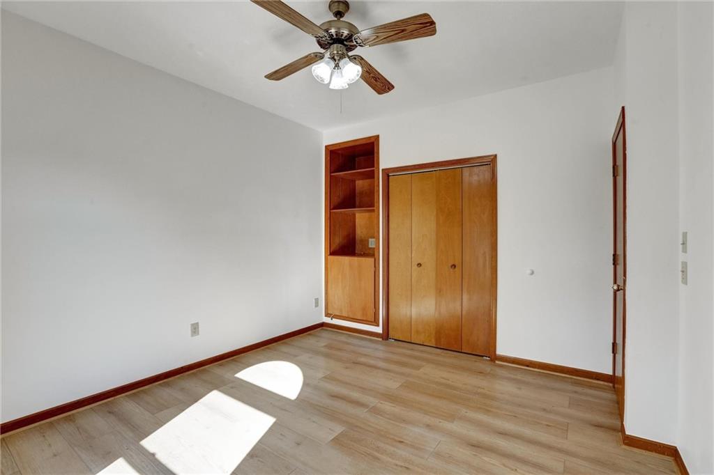 487 Ravinia Way Lawrenceville, GA 30044 - Photo 20 of 45 a view of empty room with wooden floor