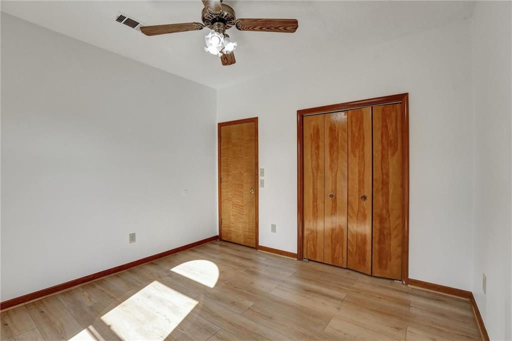 487 Ravinia Way Lawrenceville, GA 30044 - Photo 23 of 45 a view of an empty room with a window