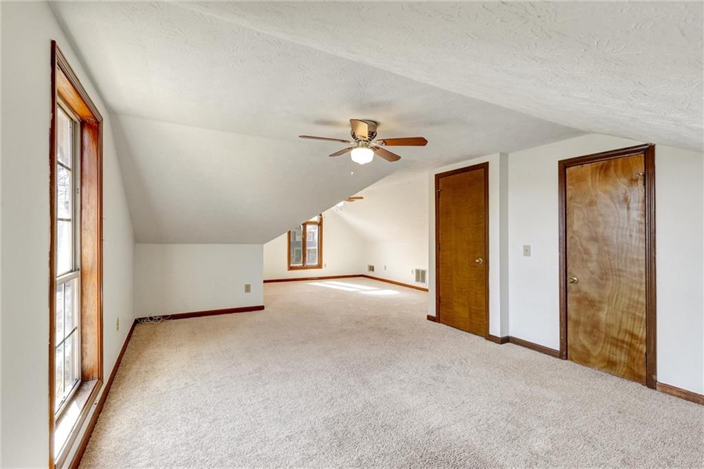 487 Ravinia Way Lawrenceville, GA 30044 - Photo 35 of 45 a view of a livingroom with a ceiling fan and window