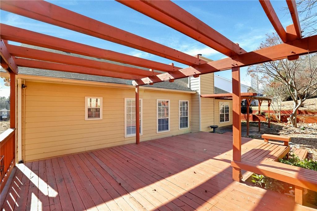 487 Ravinia Way Lawrenceville, GA 30044 - Photo 39 of 45 a view of a backyard with sitting area