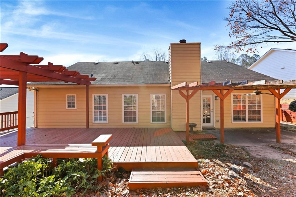 487 Ravinia Way Lawrenceville, GA 30044 - Photo 41 of 45 front view of a house with a porch
