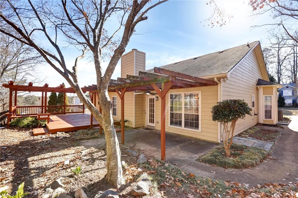 487 Ravinia Way Lawrenceville, GA 30044 - Photo 42 of 45 a front view of a house with garden