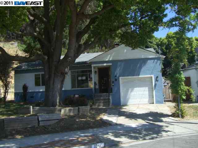 1047 Spring Court Hayward, CA 94542 - Photo 1 of 1 a front view of a house with garden