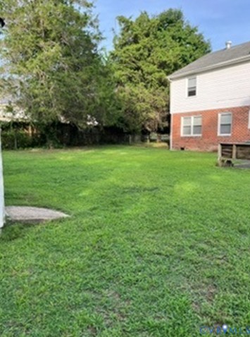 3732 Birdwood Road Richmond, VA 23234 - Photo 28 of 28 a view of a house with a yard