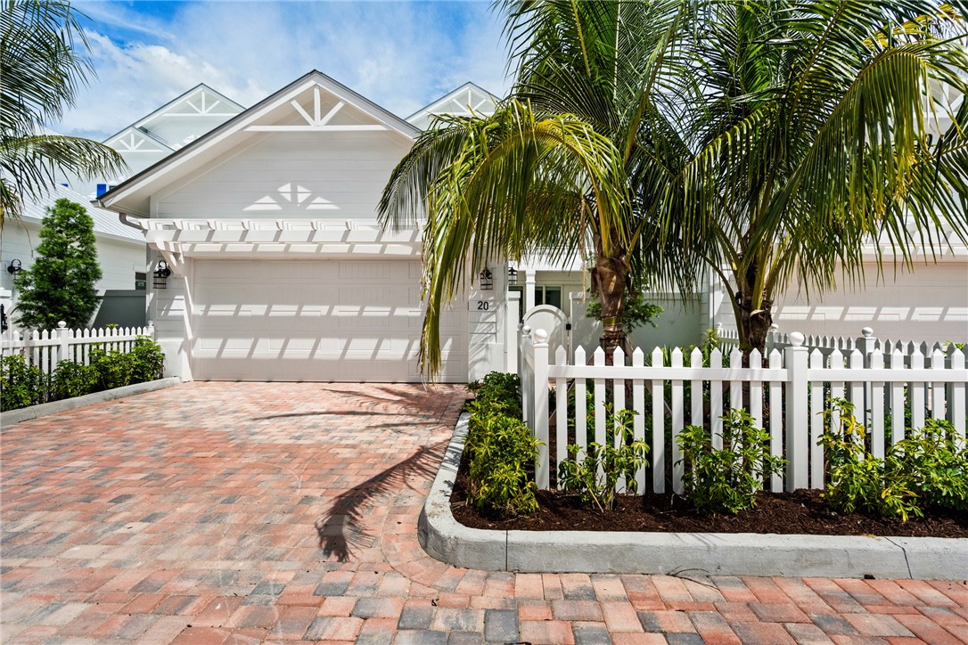 20 Strand Drive Vero Beach, FL 32963 - Photo 1 of 36 a front view of a house with garden