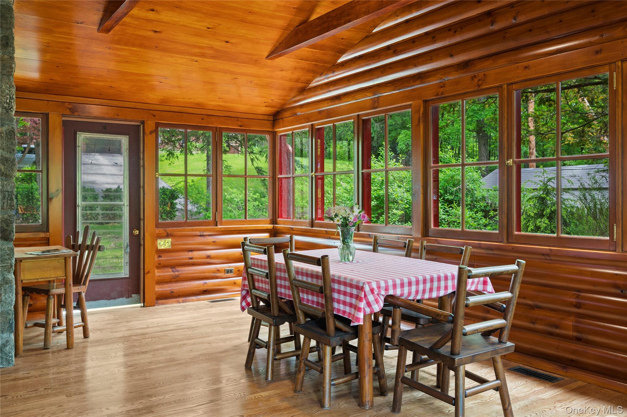 16 Locust Drive Cold Spring, NY 10516 - Photo 14 of 50 a dining room with furniture window and wooden floor