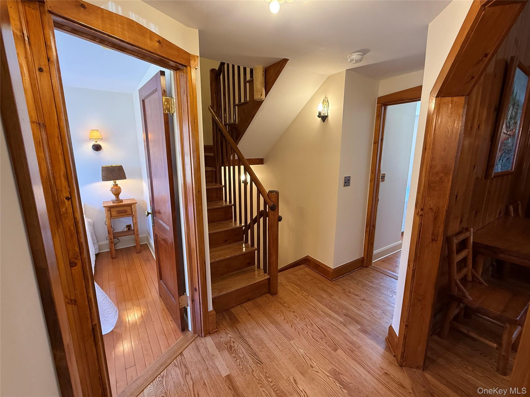 16 Locust Drive Cold Spring, NY 10516 - Photo 23 of 50 a view of a hallway with wooden floor and staircase