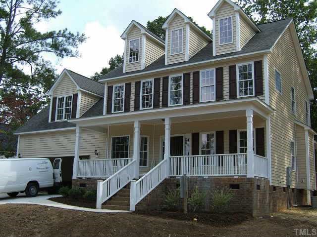 1312 Taylor Farm Road Raleigh, NC 27603 - Photo 1 of 1 a front view of a house with parking space