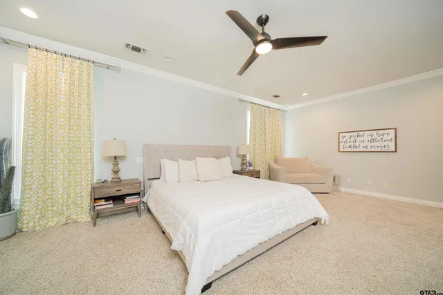 a bedroom with a bed and a walk in closet