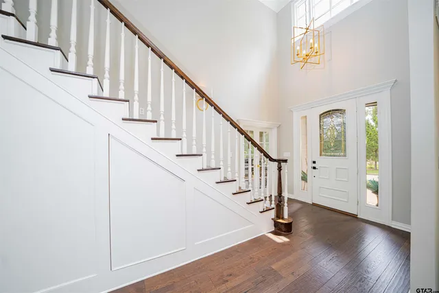 a view of entryway with wooden floor