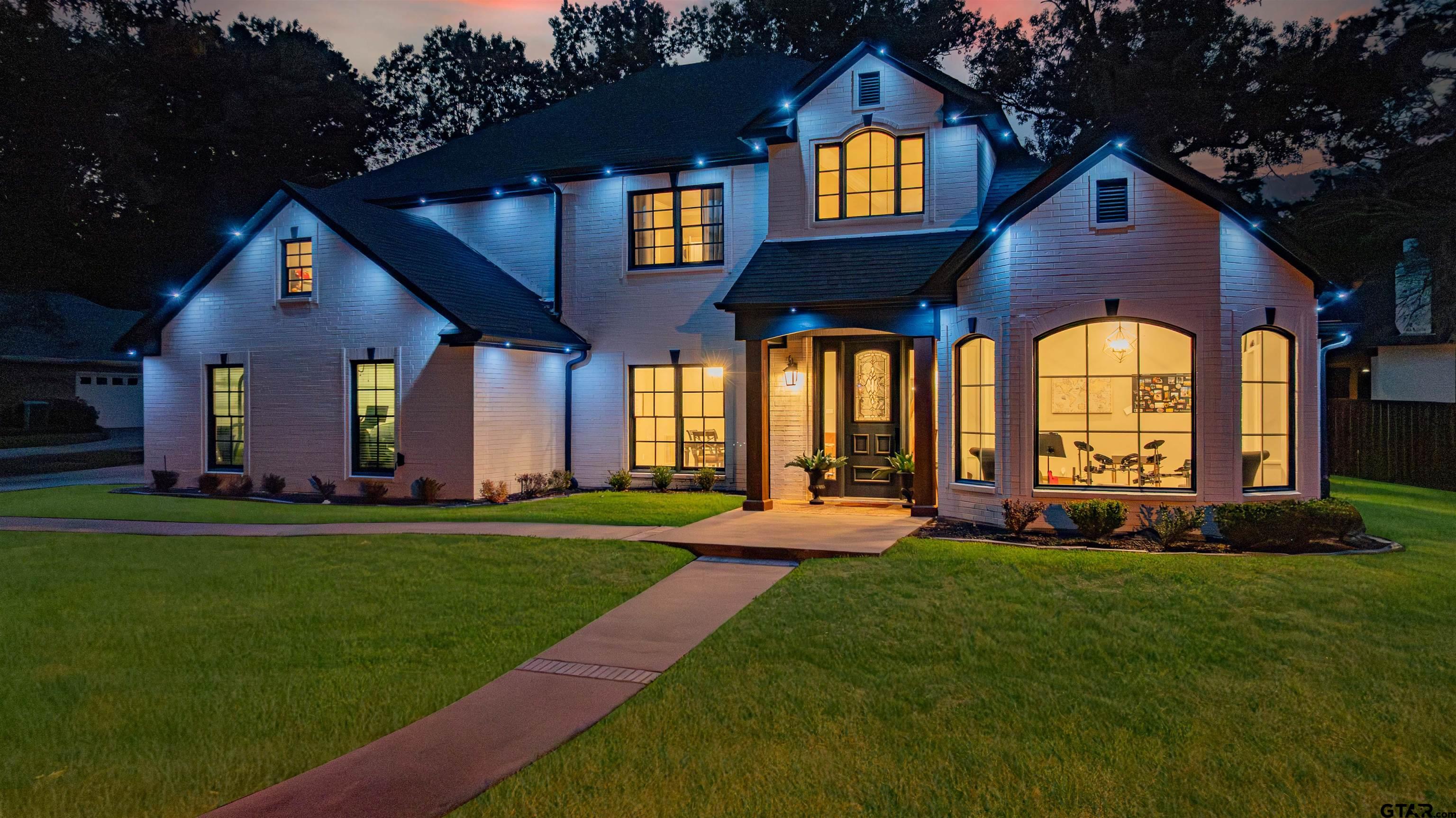 219 Hunters Circle Longview, TX 75605 - Photo 46 of 47 a front view of a house with a yard