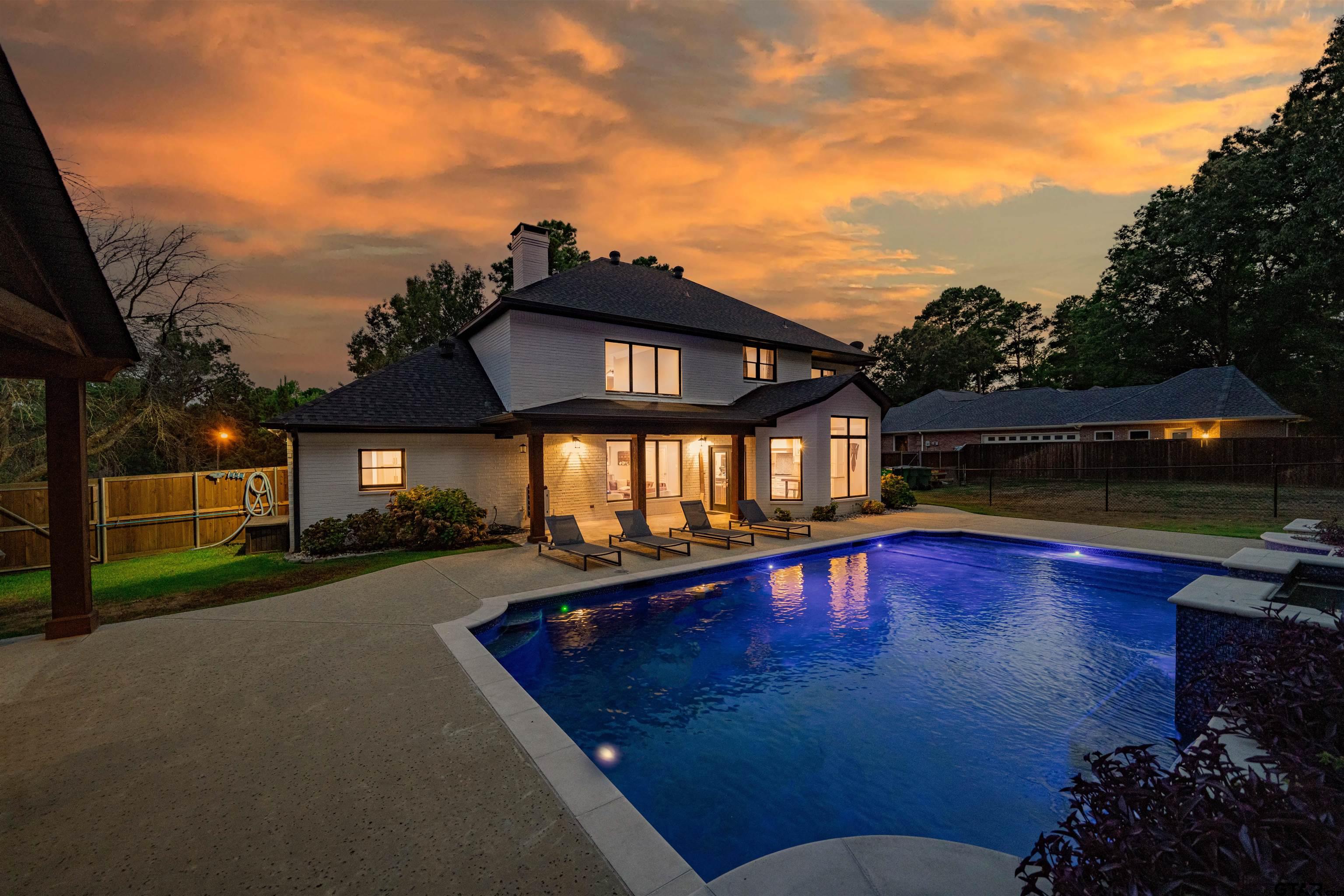 219 Hunters Circle Longview, TX 75605 - Photo 47 of 47 a view of a house with swimming pool next to a yard