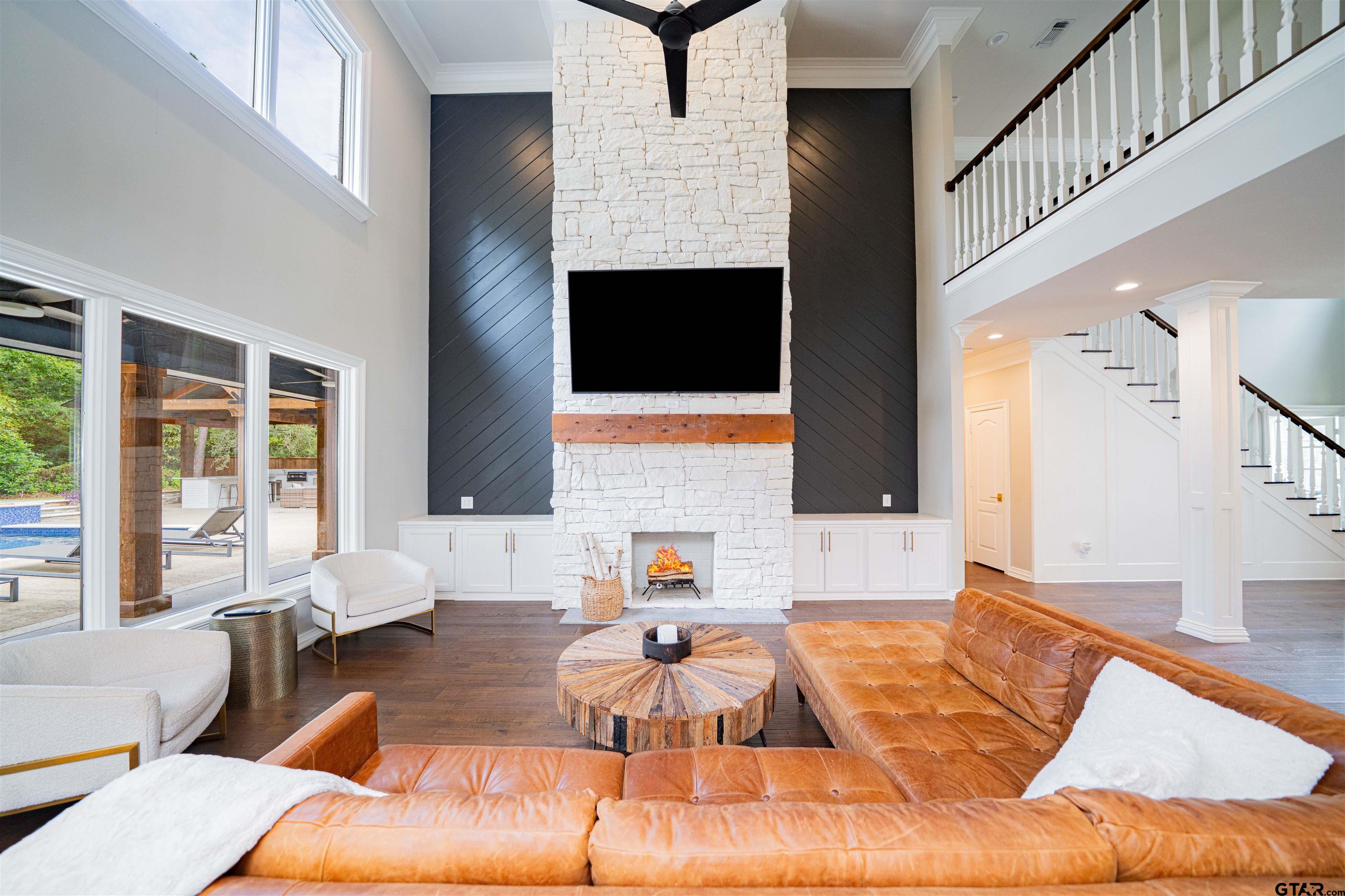 219 Hunters Circle Longview, TX 75605 - Photo 6 of 47 a living room with furniture and a fireplace