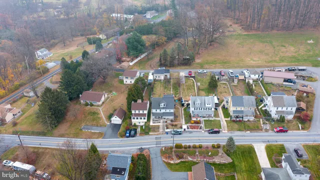 a view of swimming pool with outdoor seating