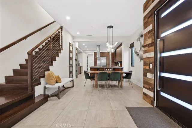 a outdoor space with lots of chairs and mirrors