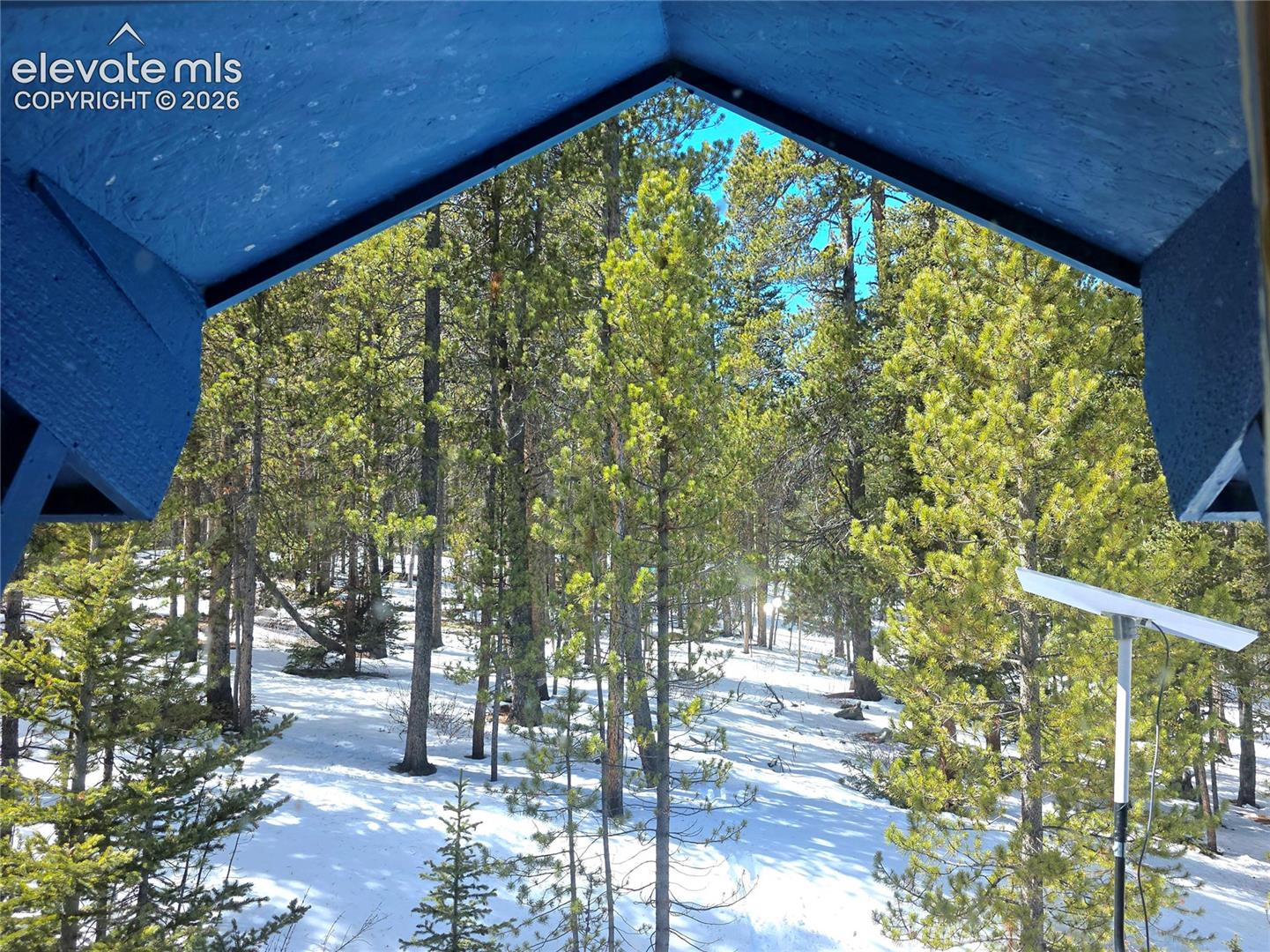 211 Pine Ridge Road Alma, CO 80420 - Photo 7 of 36 View from the upper level entry door looking out. Winter wonderland in the alpine