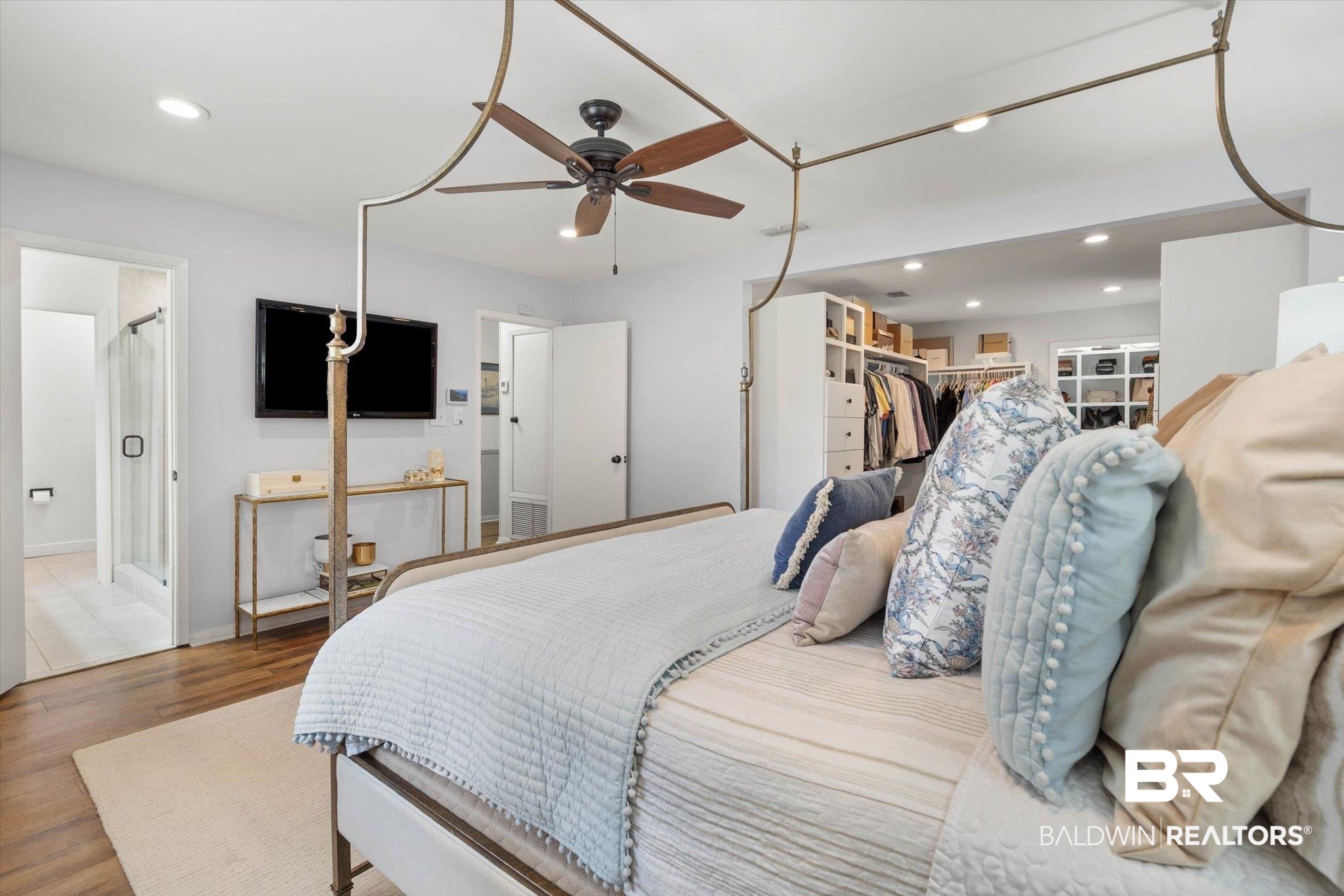 254 Woodlands Avenue Mobile, AL 36607 - Photo 48 of 50 Bedroom featuring recessed lighting, wood finished floors, ceiling fan, a closet, and connected bathroom