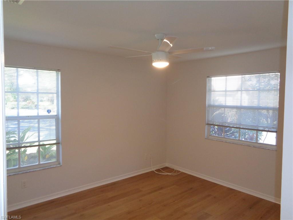 264 Perignon Place, Unit 113 Naples, FL 34119 - Photo 11 of 15 an empty room with a window