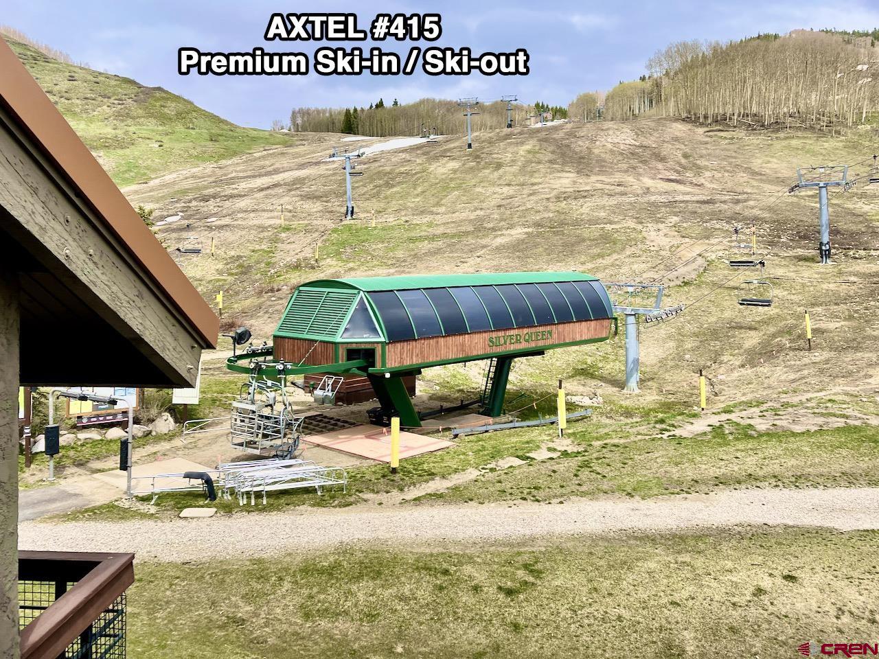 12 Snowmass Road, Unit AXTEL #415 Crested Butte, CO 81225 - Photo 13 of 35 a view of swimming pool with lawn chairs