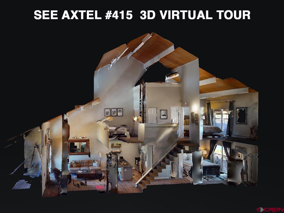 12 Snowmass Road, Unit AXTEL #415 Crested Butte, CO 81225 - Photo 17 of 35 a front view of a house