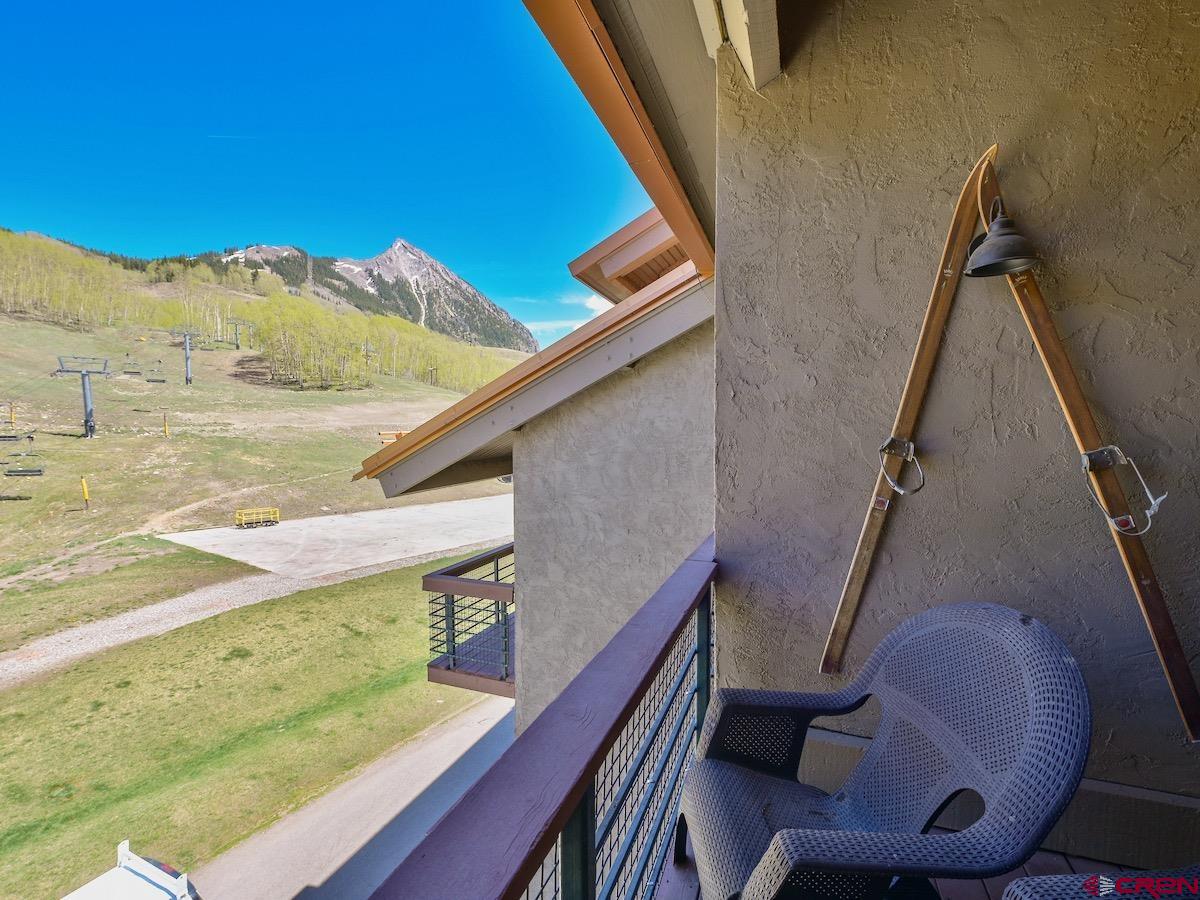 12 Snowmass Road, Unit AXTEL #415 Crested Butte, CO 81225 - Photo 27 of 35 a view of balcony with furniture