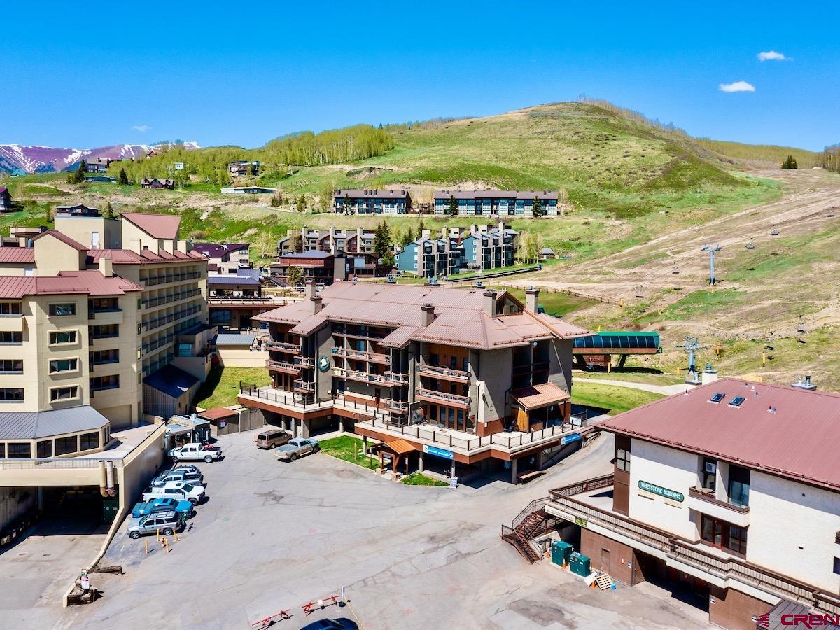 12 Snowmass Road, Unit AXTEL #415 Crested Butte, CO 81225 - Photo 34 of 35 an aerial view of multiple houses with a city view
