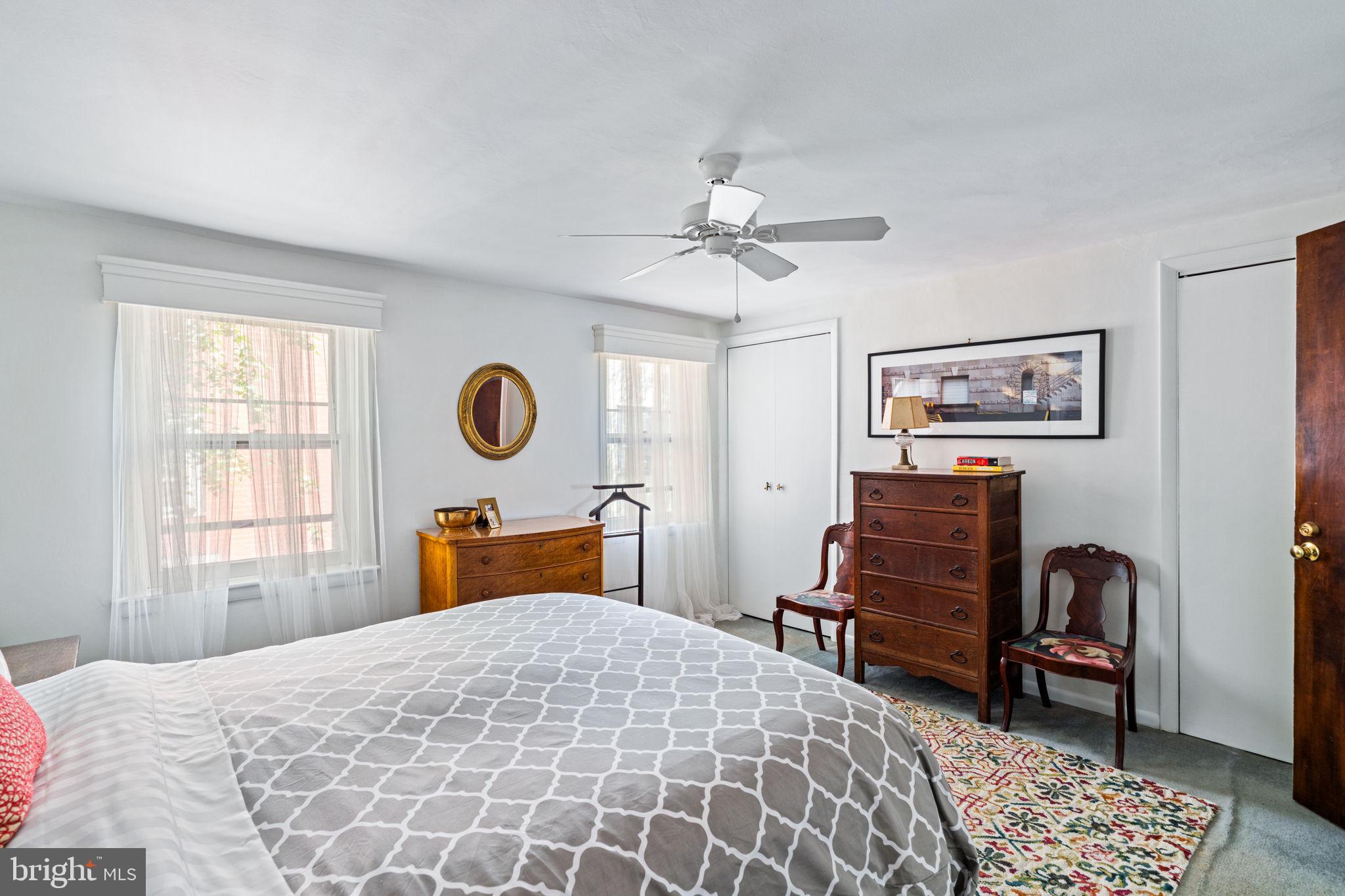 2410 Panama Street Philadelphia, PA 19103 - Photo 25 of 50 a bedroom with a bed dresser and a window