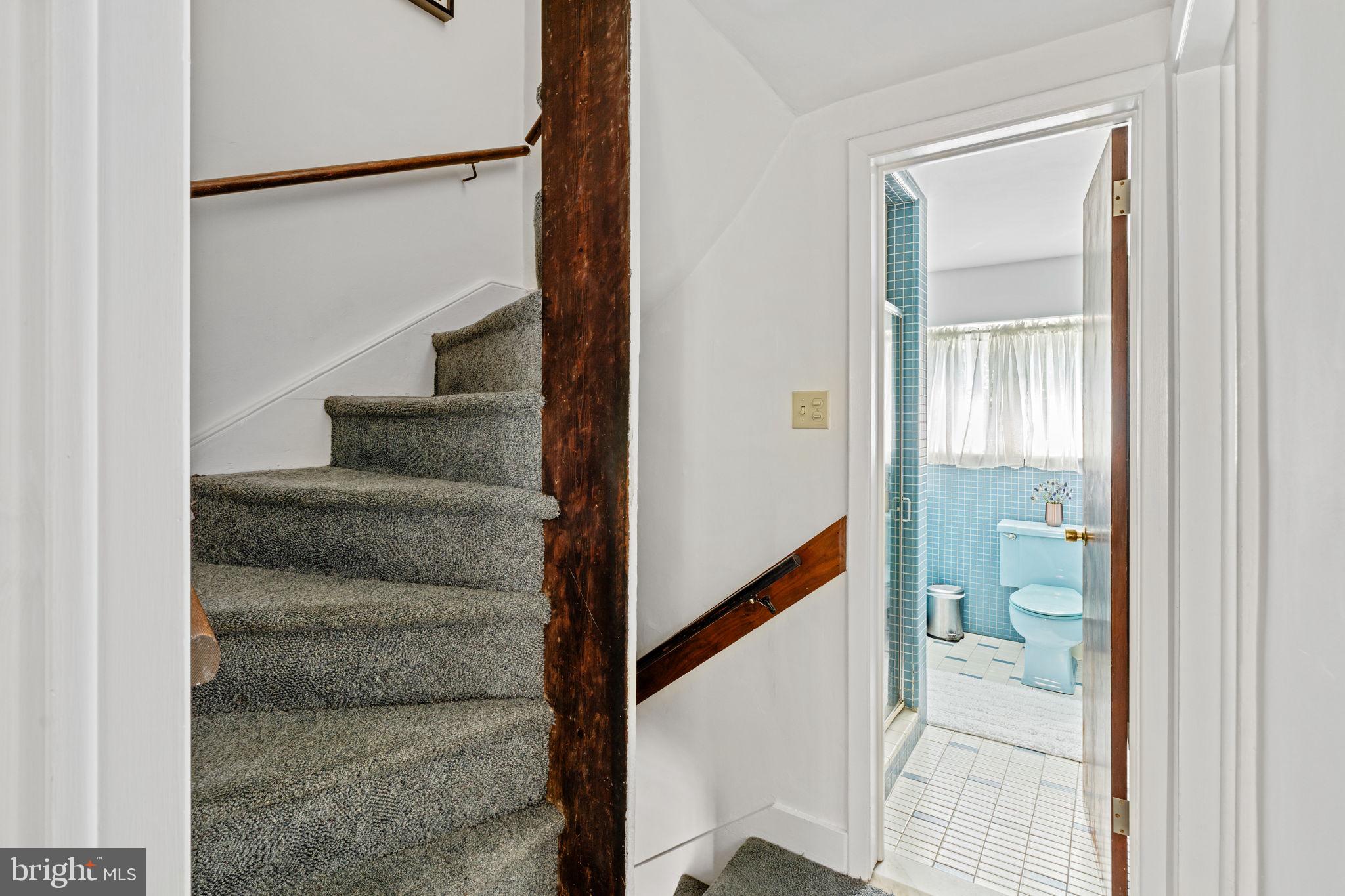 2410 Panama Street Philadelphia, PA 19103 - Photo 27 of 50 a view of staircase with white walls and railing