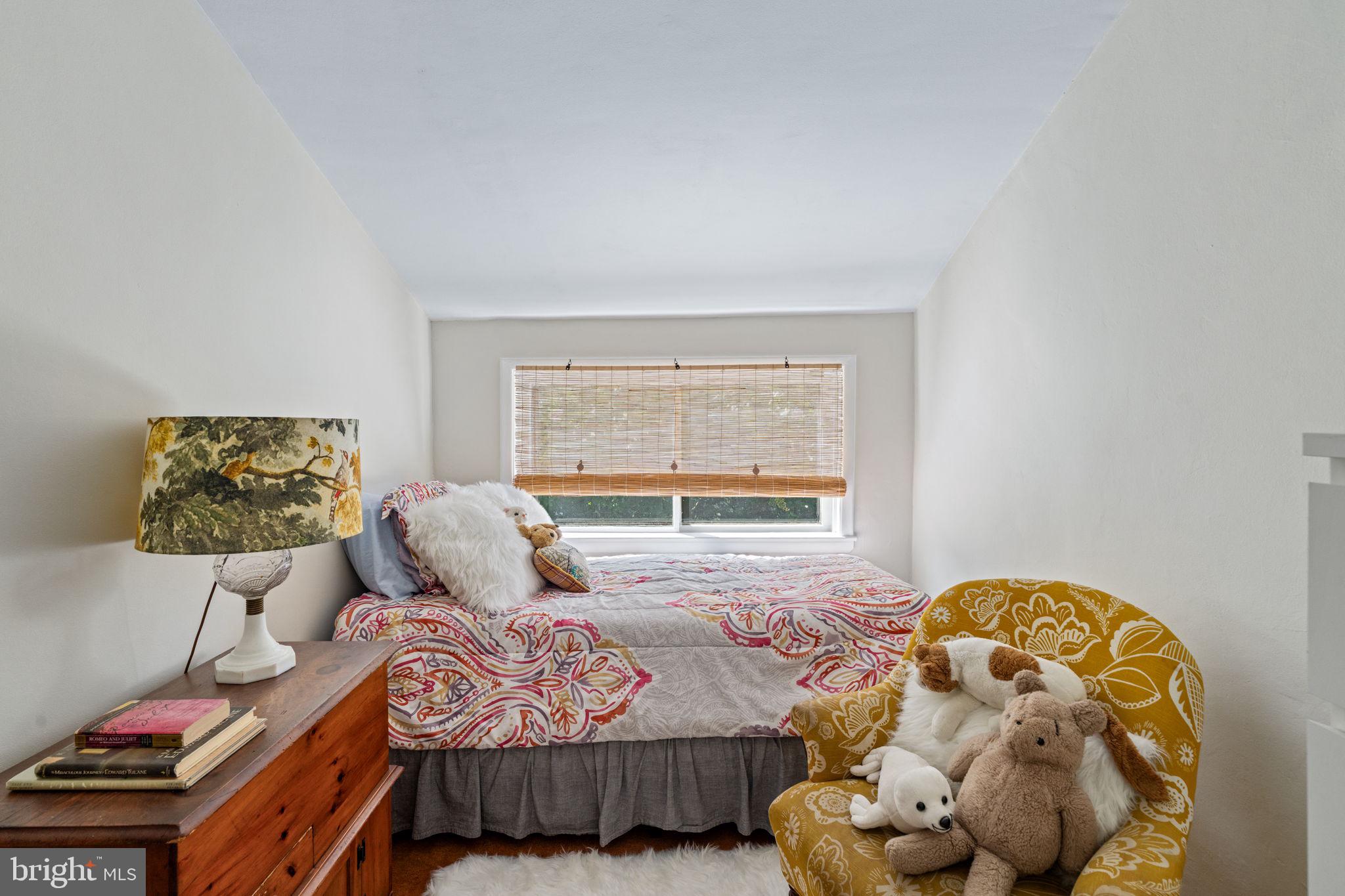 2410 Panama Street Philadelphia, PA 19103 - Photo 36 of 50 a bedroom with a bed and a painting on the wall