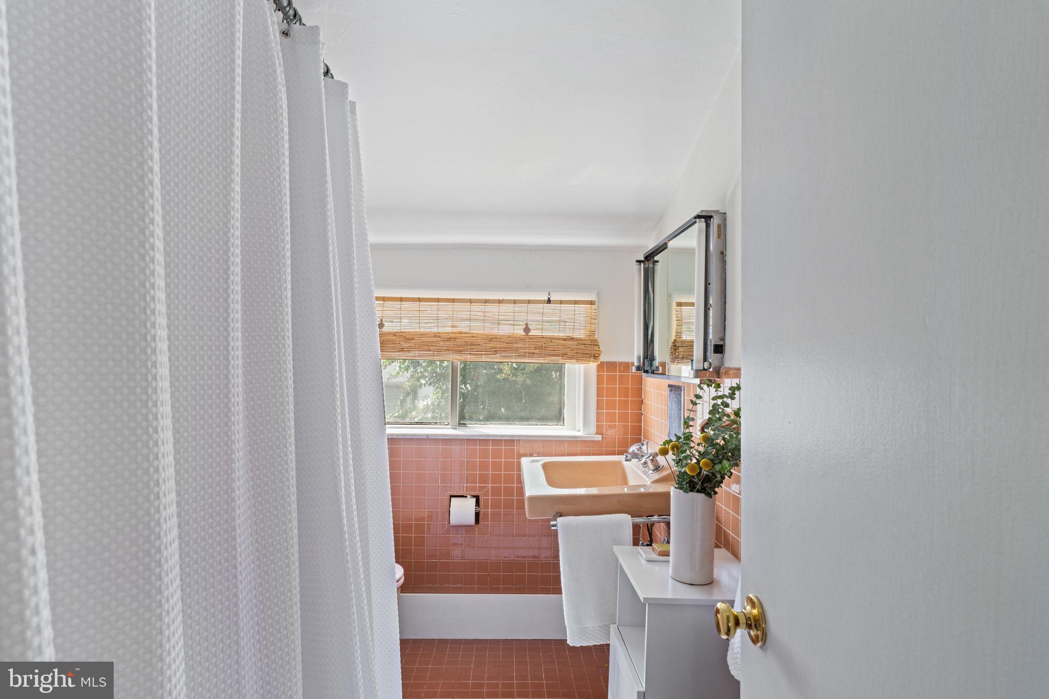2410 Panama Street Philadelphia, PA 19103 - Photo 38 of 50 a living room with furniture and a window