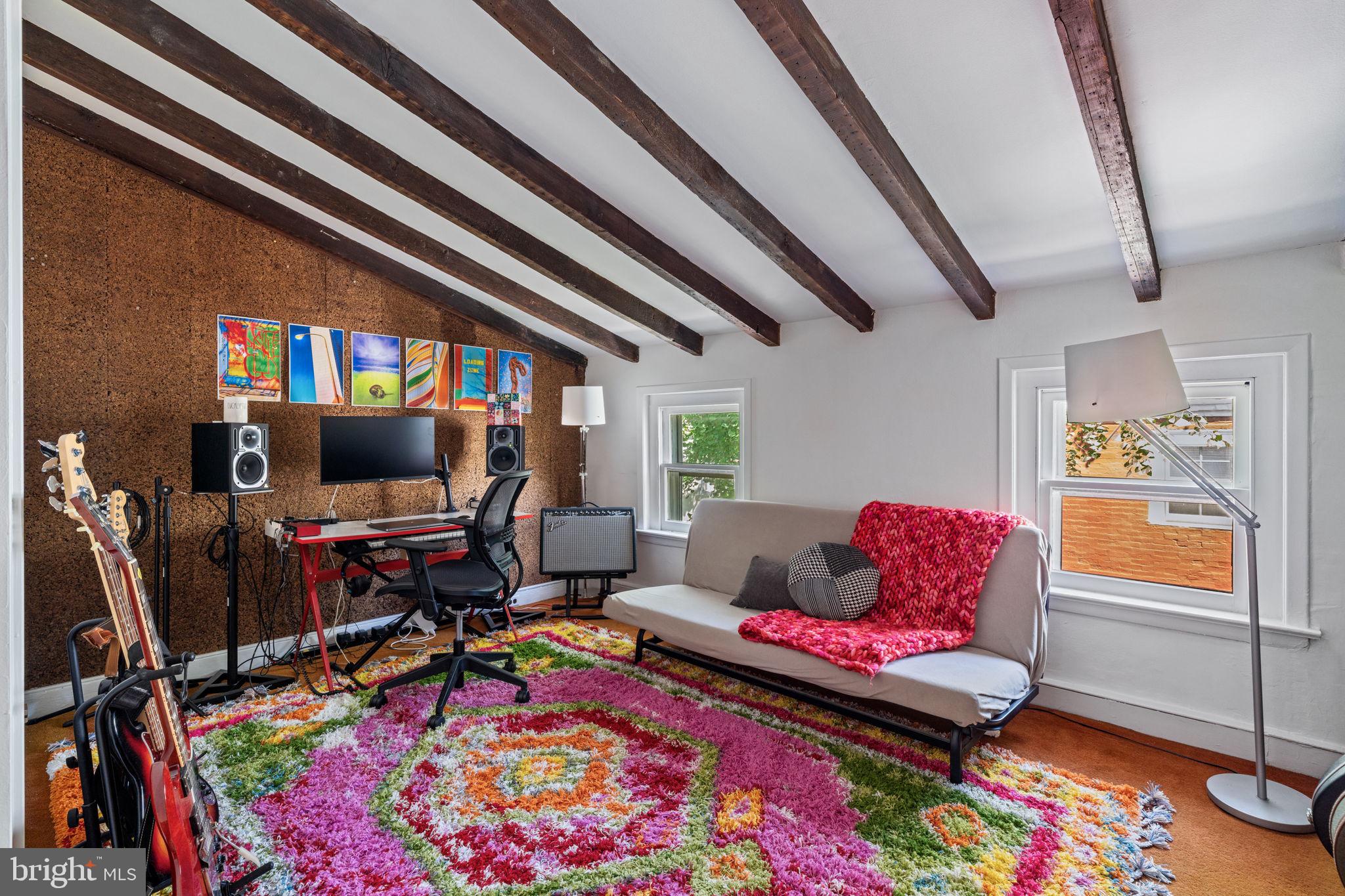 2410 Panama Street Philadelphia, PA 19103 - Photo 41 of 50 a living room with furniture and a flat screen tv