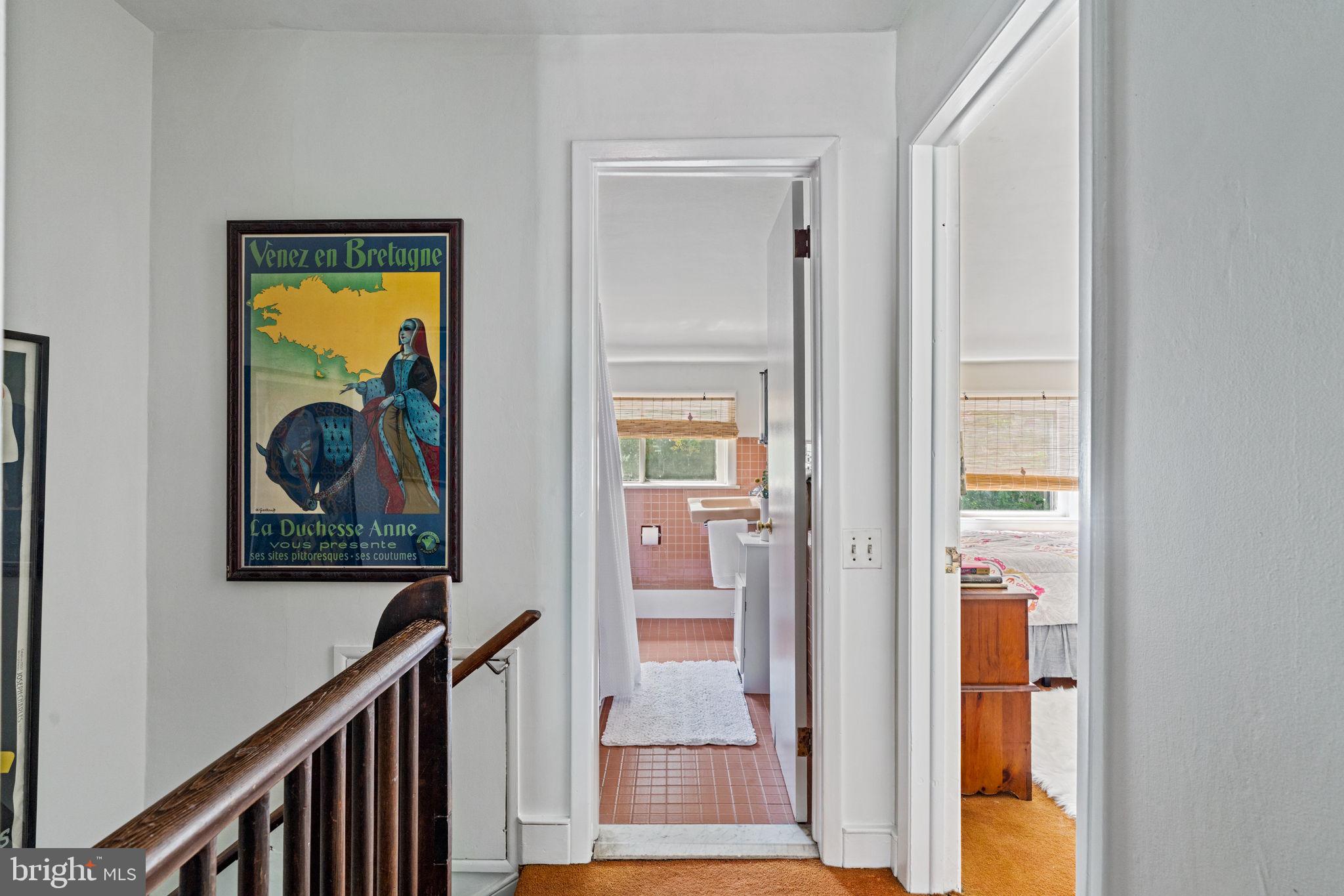 2410 Panama Street Philadelphia, PA 19103 - Photo 45 of 50 a view of a hallway with wooden floor and windows