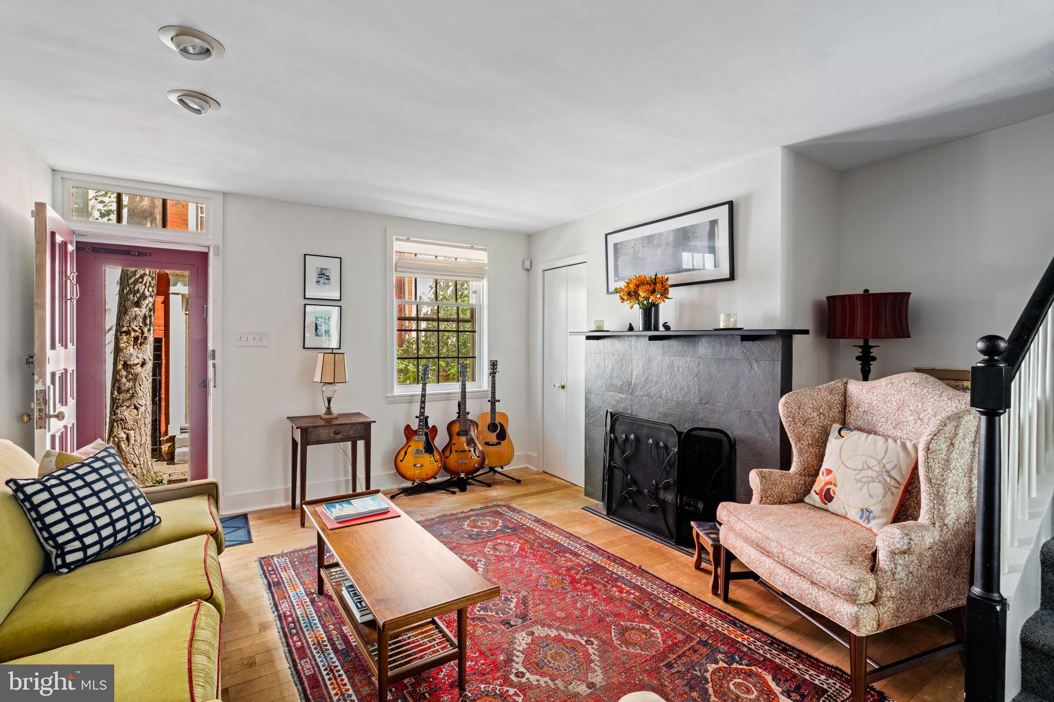 2410 Panama Street Philadelphia, PA 19103 - Photo 6 of 50 a living room with furniture and a fireplace