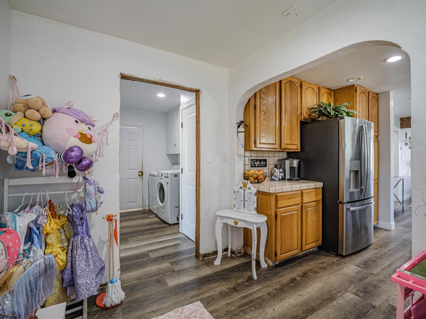 27 Burchell Avenue Watsonville, CA 95076 - Photo 14 of 27 a view of a kitchen with fridge and workspace