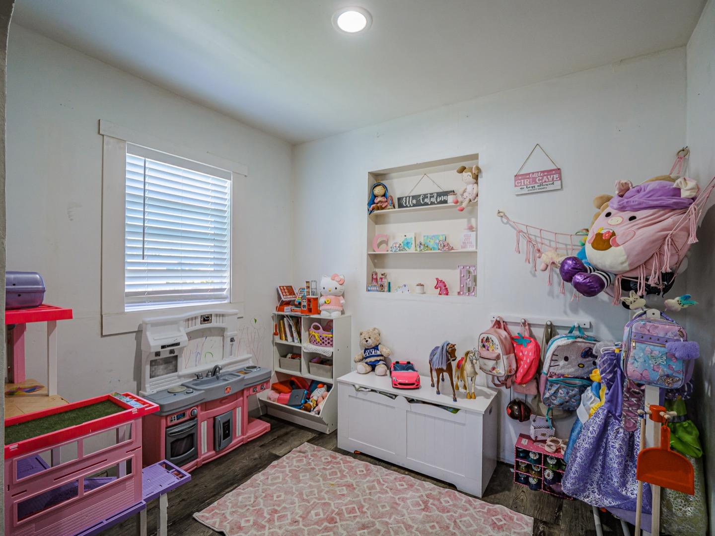 27 Burchell Avenue Watsonville, CA 95076 - Photo 15 of 27 a room with furniture and a window