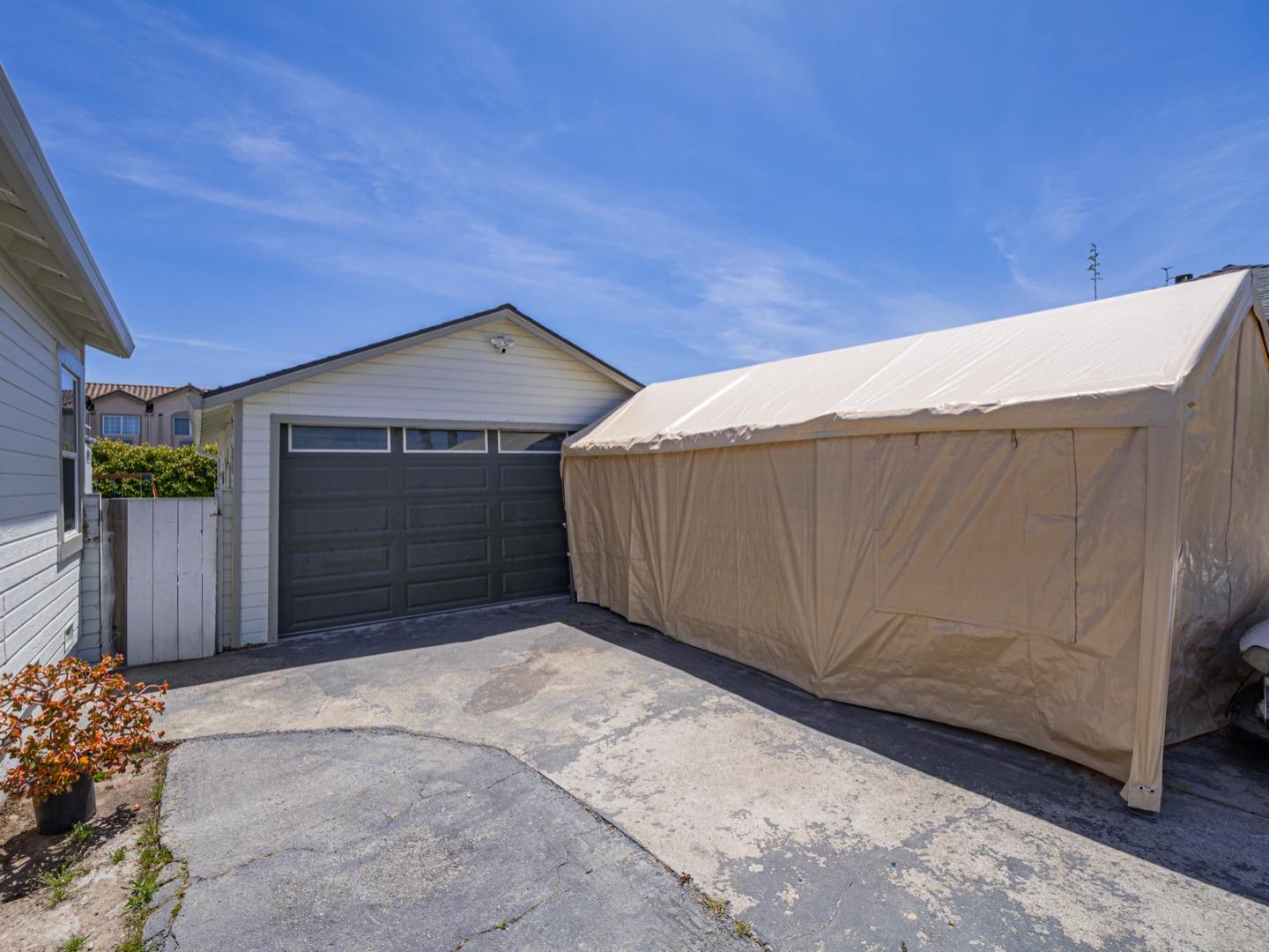 27 Burchell Avenue Watsonville, CA 95076 - Photo 26 of 27 a front view of a house with a garage