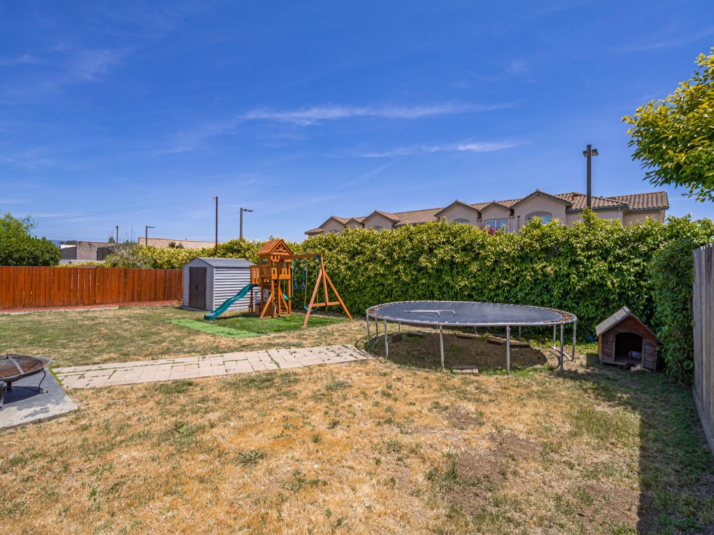 27 Burchell Avenue Watsonville, CA 95076 - Photo 27 of 27 a view of a yard with a house