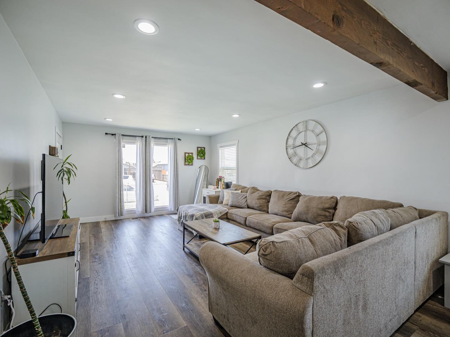 27 Burchell Avenue Watsonville, CA 95076 - Photo 6 of 27 a living room with furniture and wooden floor