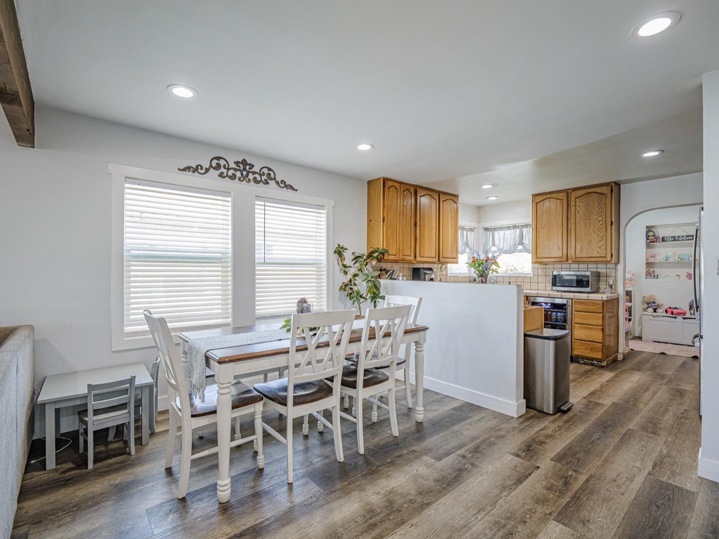 27 Burchell Avenue Watsonville, CA 95076 - Photo 8 of 27 a view of a dining room with furniture and wooden floor