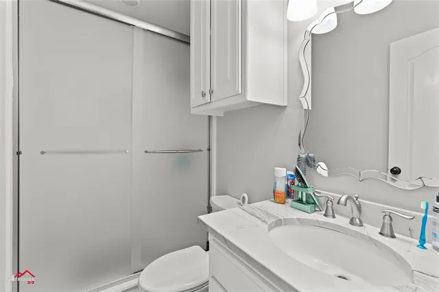 a view of a hallway with a large window