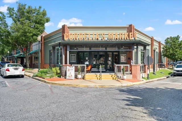 a view of a building with sitting area