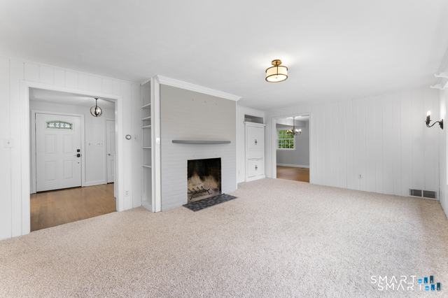 62 Chatham Road Berlin, CT 06037 - Photo 17 of 38 a view of empty room with a fireplace