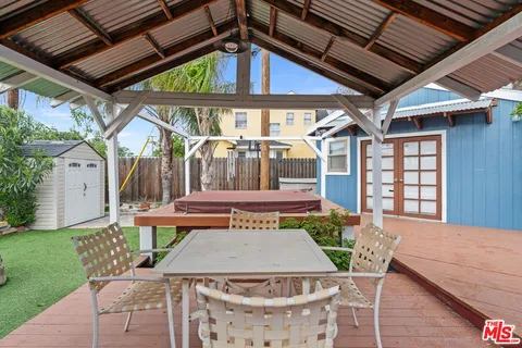 a view of a table and chairs in patio