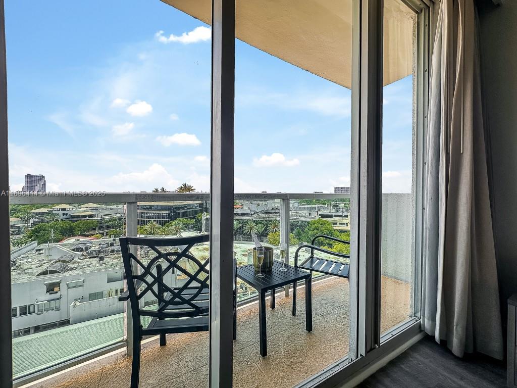 2889 McFarlane Road, Unit 912 Miami, FL 33133 - Photo 20 of 20 a view of a city from a window