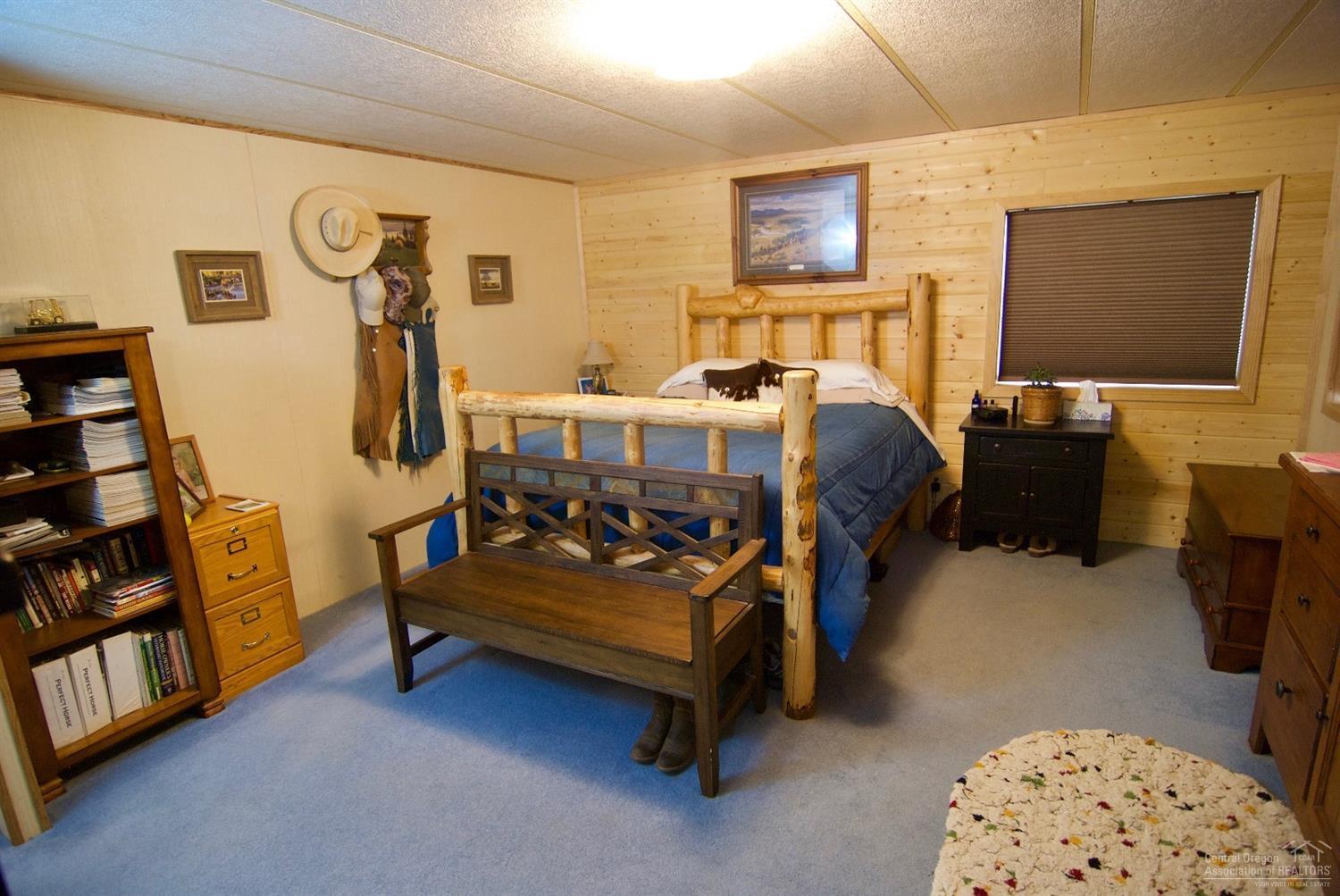 6006 Southwest Cougar Road Terrebonne, OR 97760 - Photo 5 of 20 Large Master Bedroom with pine accent wa