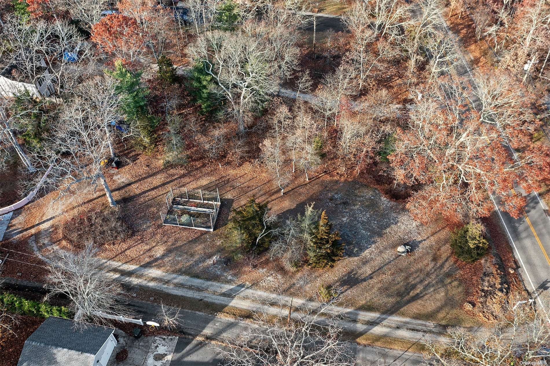 40 West Tiana Road Hampton Bays, NY 11946 - Photo 1 of 1 a view of a yard with trees