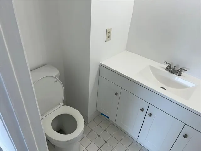 a bathroom with a sink and a toilet