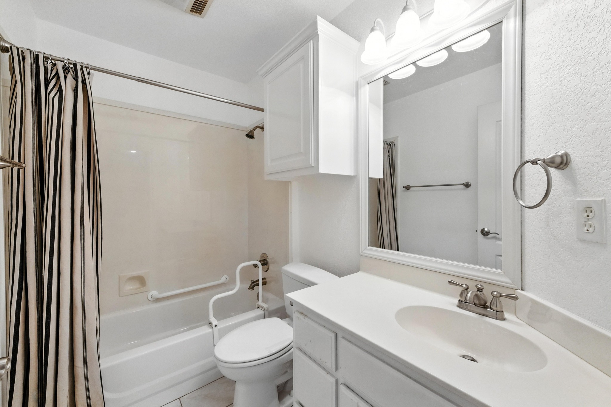 125 Melissa Court Georgetown, TX 78628 - Photo 22 of 29 a bathroom with a sink toilet and shower